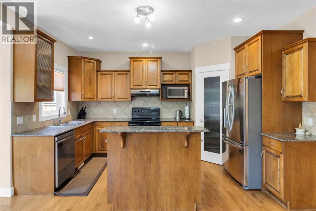 Single Family House for Sale in  Elmont Court SW Springbank Hill Calgary 