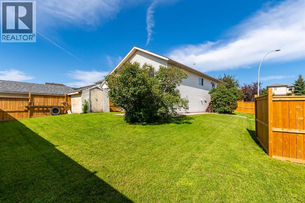 Single Family House Bi-level for Sale in  Erin Circle SE Erin Woods Calgary 
