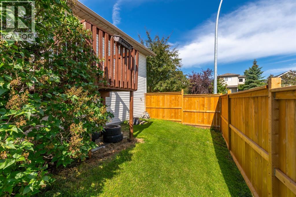 Single Family House Bi-level for Sale in  Erin Circle SE Erin Woods Calgary 