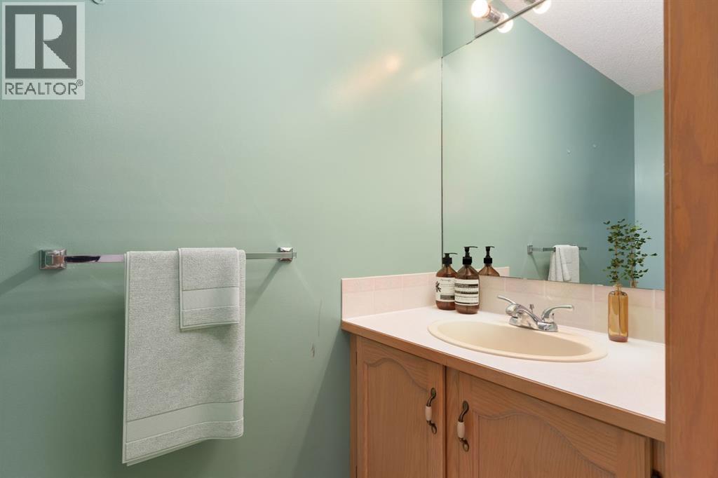 Single Family House Bi-level for Sale in  Erin Circle SE Erin Woods Calgary 