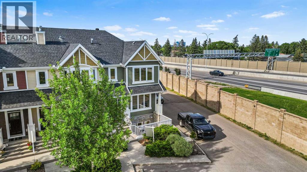 Single Family House Bungalow for Sale in  Mike Ralph Way SW Garrison Green Calgary 