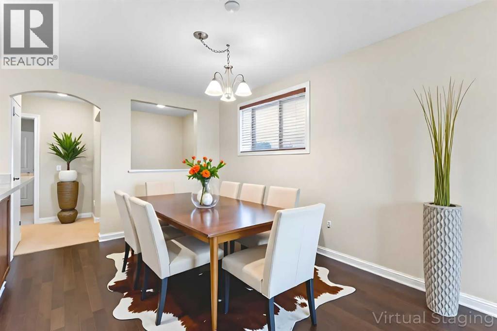 Single Family House Bungalow for Sale in  Mike Ralph Way SW Garrison Green Calgary 