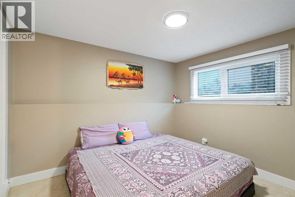 Single Family House 4 Level for Sale in  Brookgreen Drive SW Braeside Calgary 