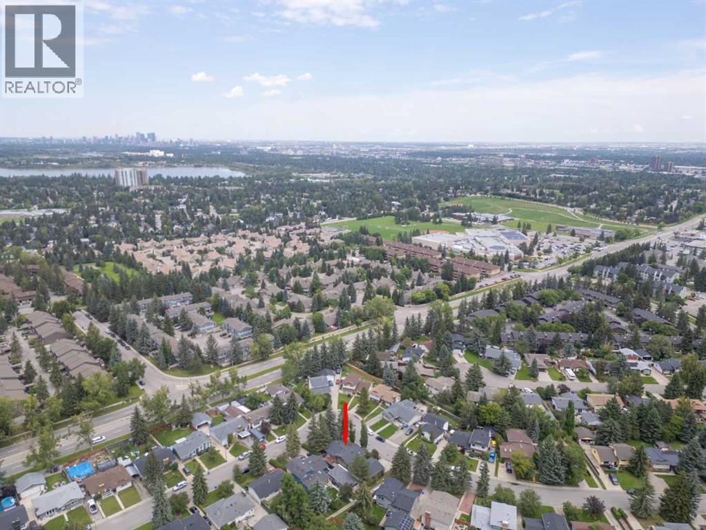 Single Family House 4 Level for Sale in  Brookgreen Drive SW Braeside Calgary 