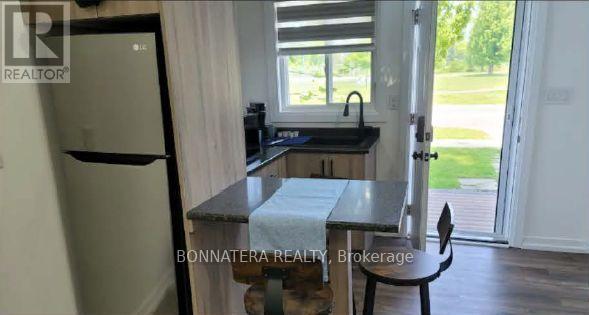 Photo 23 of 687 Innisfil Beach Road, Innisfil ON