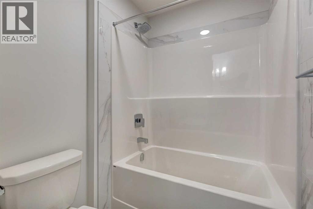 Photo 23 of 98 Silver Spruce Road Sw, Calgary AB