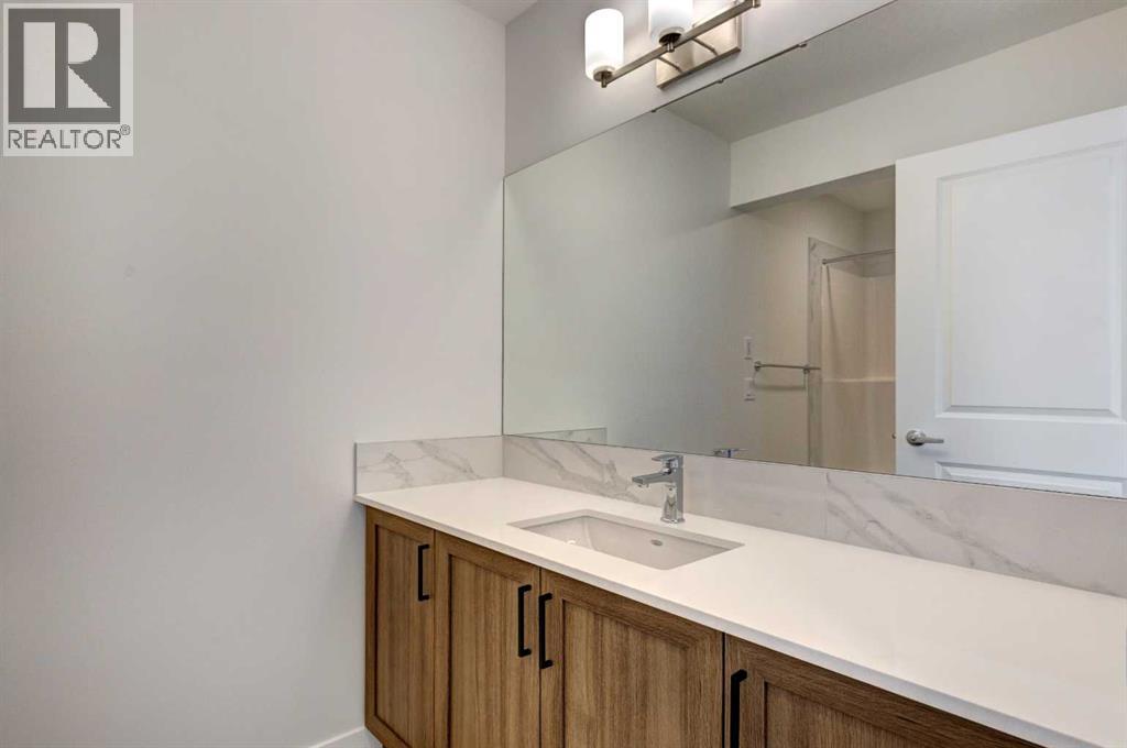 Photo 38 of 98 Silver Spruce Road Sw, Calgary AB