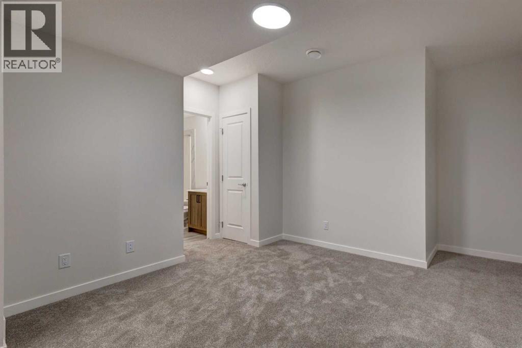 Photo 10 of 98 Silver Spruce Road Sw, Calgary AB