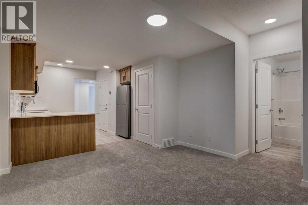 Photo 3 of 98 Silver Spruce Road Sw, Calgary AB