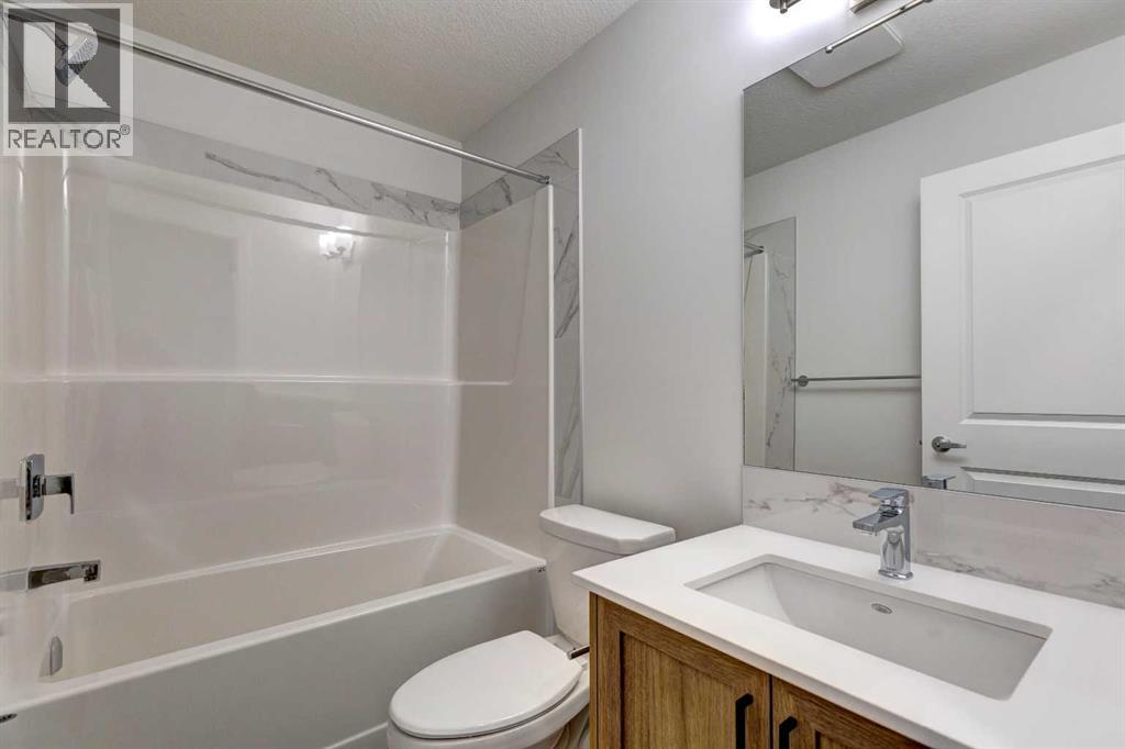 Photo 5 of 98 Silver Spruce Road Sw, Calgary AB