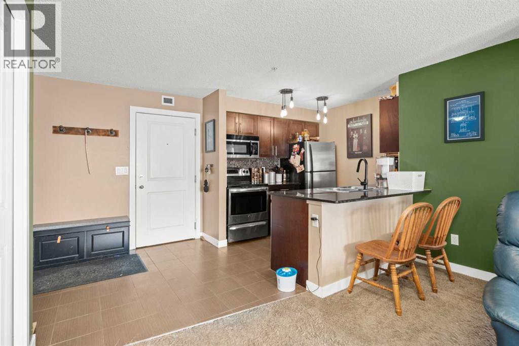 Photo 9 of 3309 403 Mackenzie Way Sw, Airdrie AB