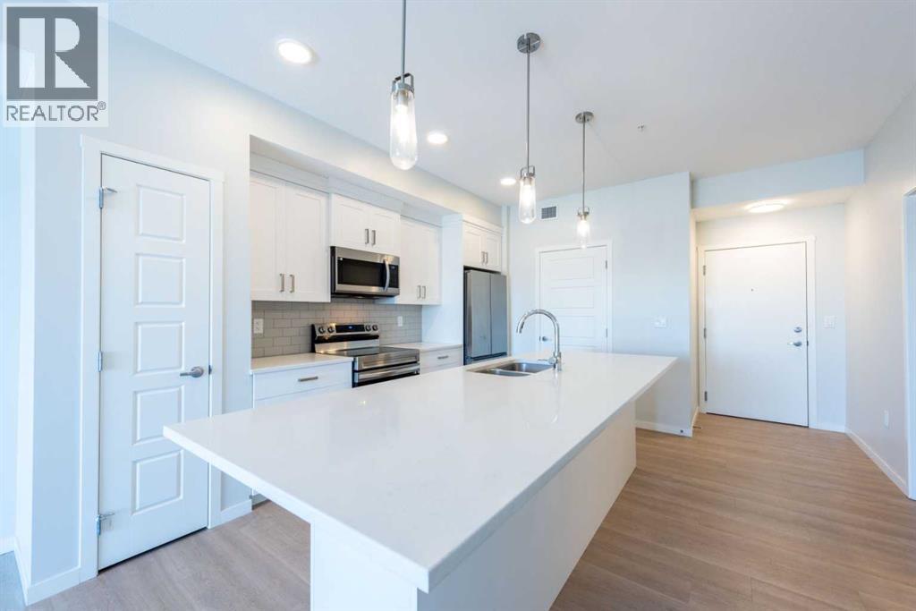 425, 360 HARVEST HILLS WAY NE - Image 1
