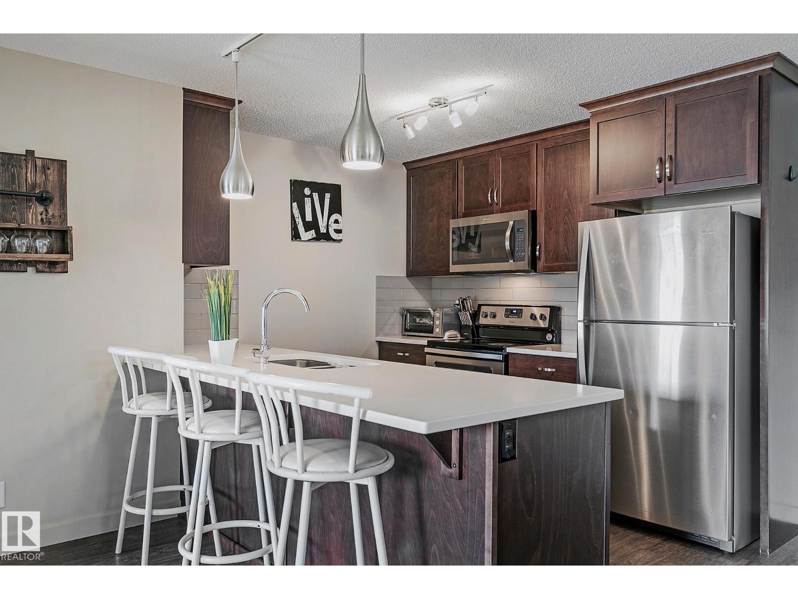 Photo 3 of 104 4008 Savaryn Dr Sw, Edmonton AB