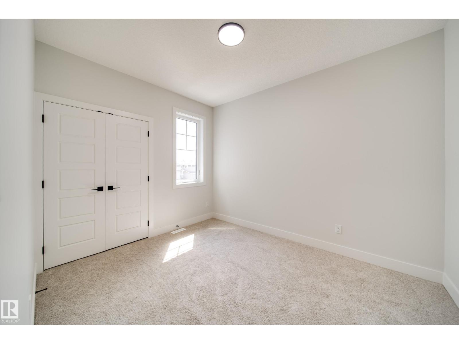 Photo 11 of 8824 183 Av Nw, Edmonton AB