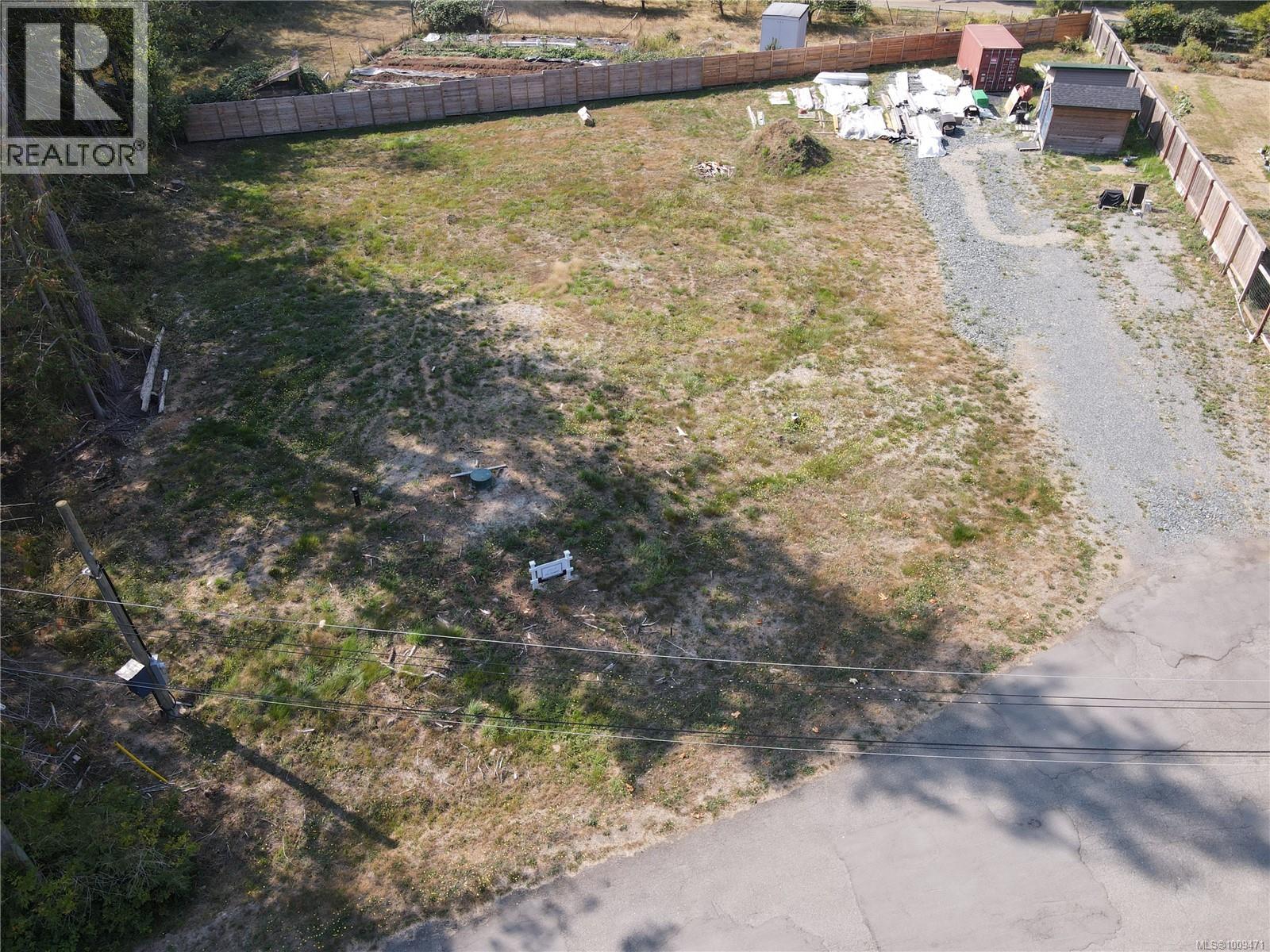 Photo 5 of 1060 Mclaughlin Pl, Qualicum Beach BC