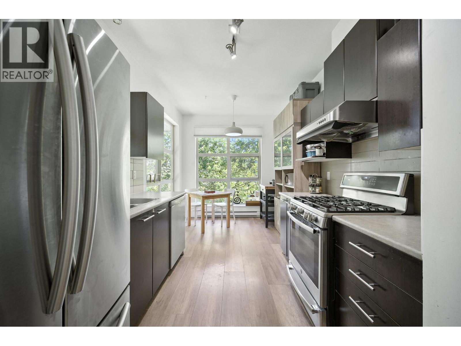 Photo 3 of 407 9319 University Crescent, Burnaby BC