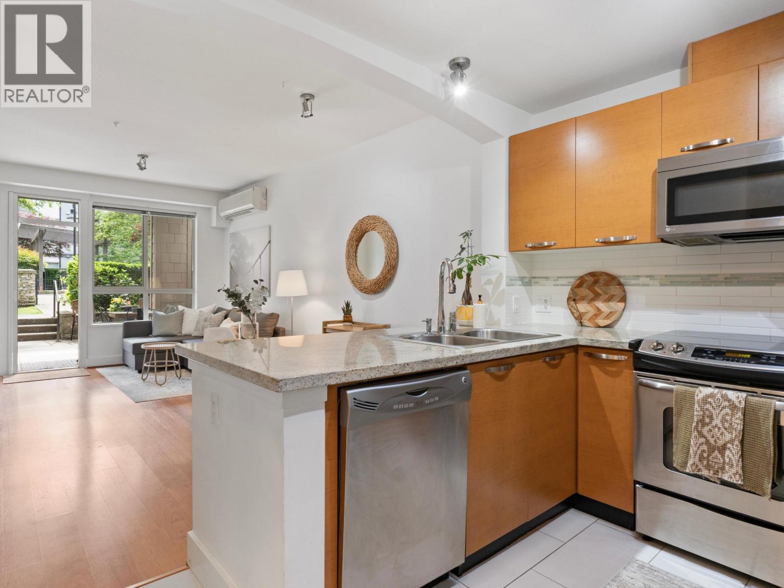 Photo 5 of 208 7428 Byrnepark Walk, Burnaby BC
