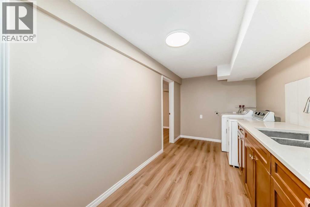 Single Family House 4 Level for Sale in  Sandstone Road NW Sandstone Valley Calgary 