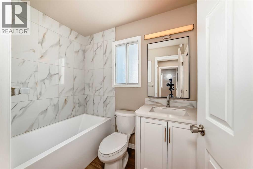 Single Family House 4 Level for Sale in  Sandstone Road NW Sandstone Valley Calgary 