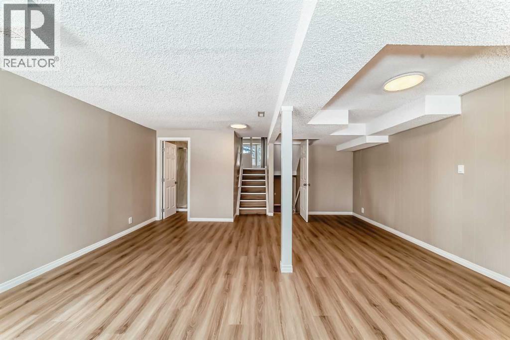 Single Family House 4 Level for Sale in  Sandstone Road NW Sandstone Valley Calgary 