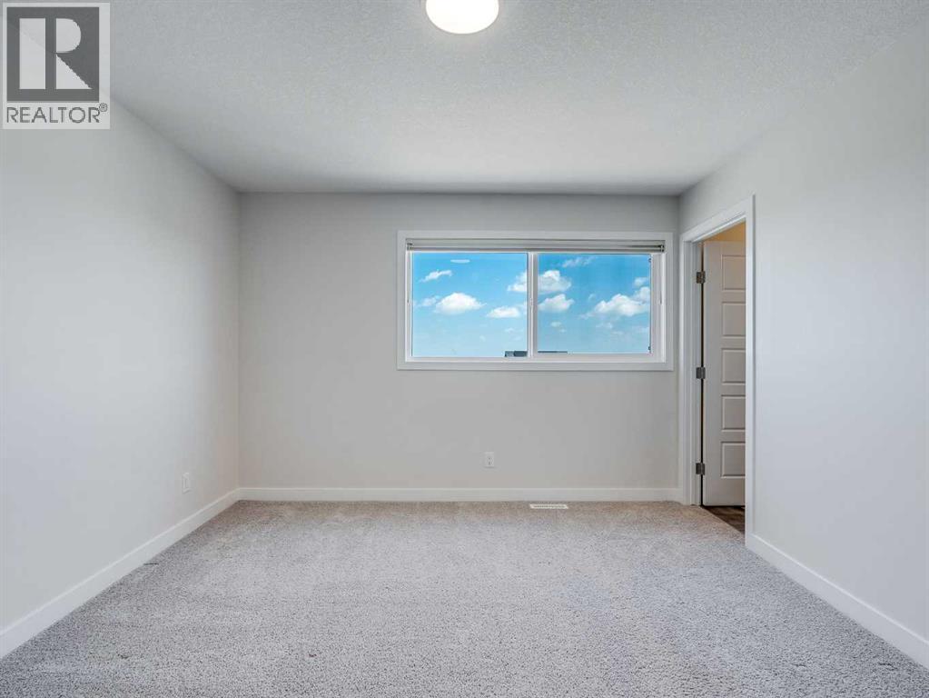 Single Family House 5 Level for Sale in  Aquila Way NW Glacier Ridge Calgary 