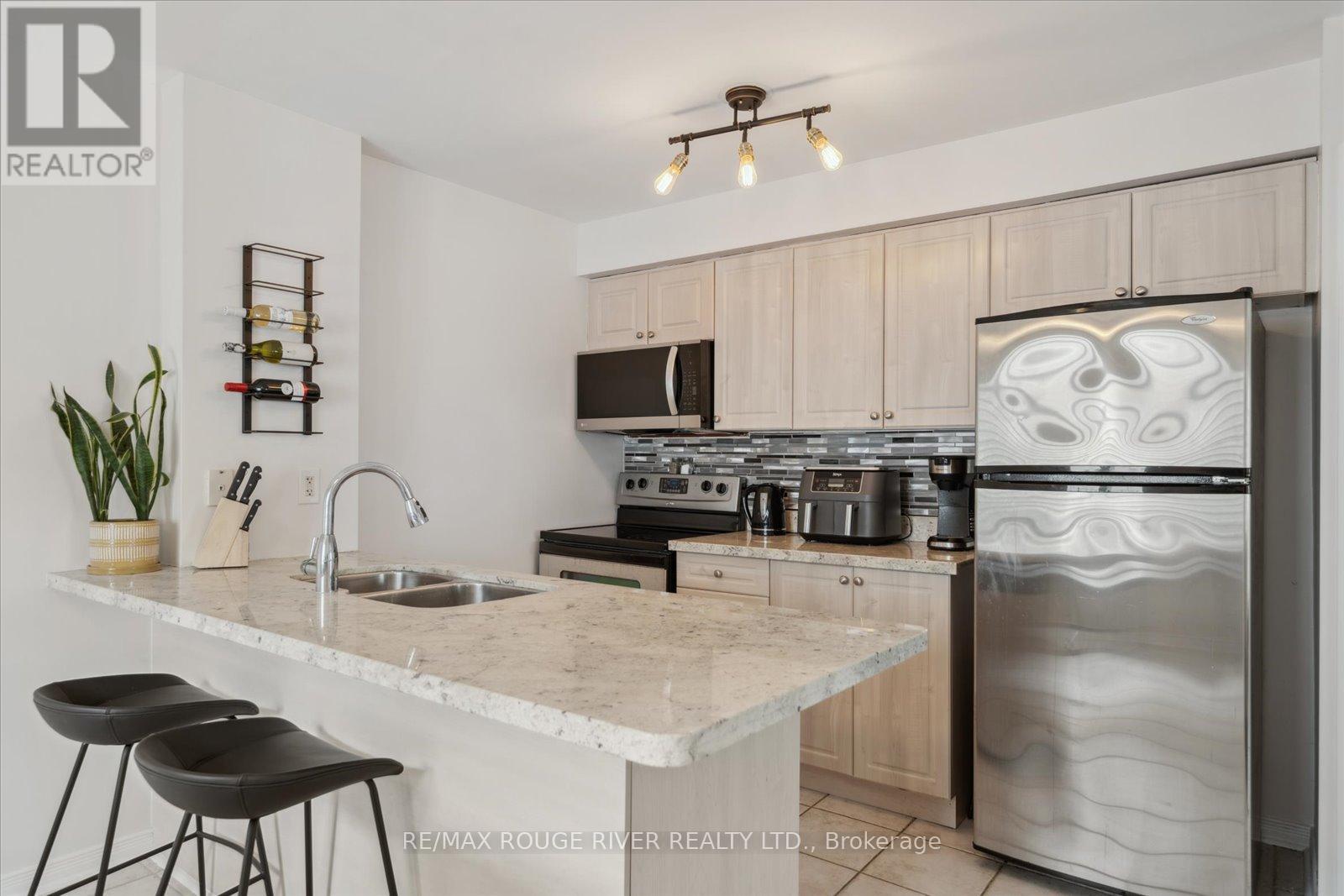 Photo 16 of 212 102 Aspen Springs Drive, Clarington ON