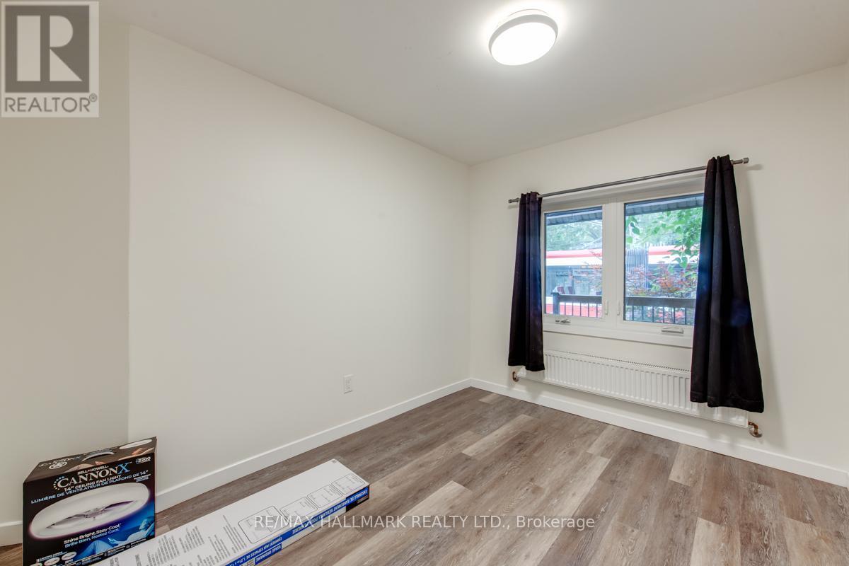 Photo 12 of Main 233 Kingston Road, Toronto ON