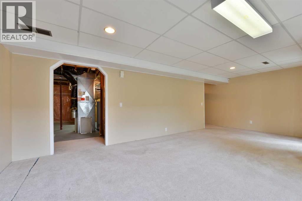 Photo 22 of 155 Macewan Ridge Villas Nw, Calgary AB