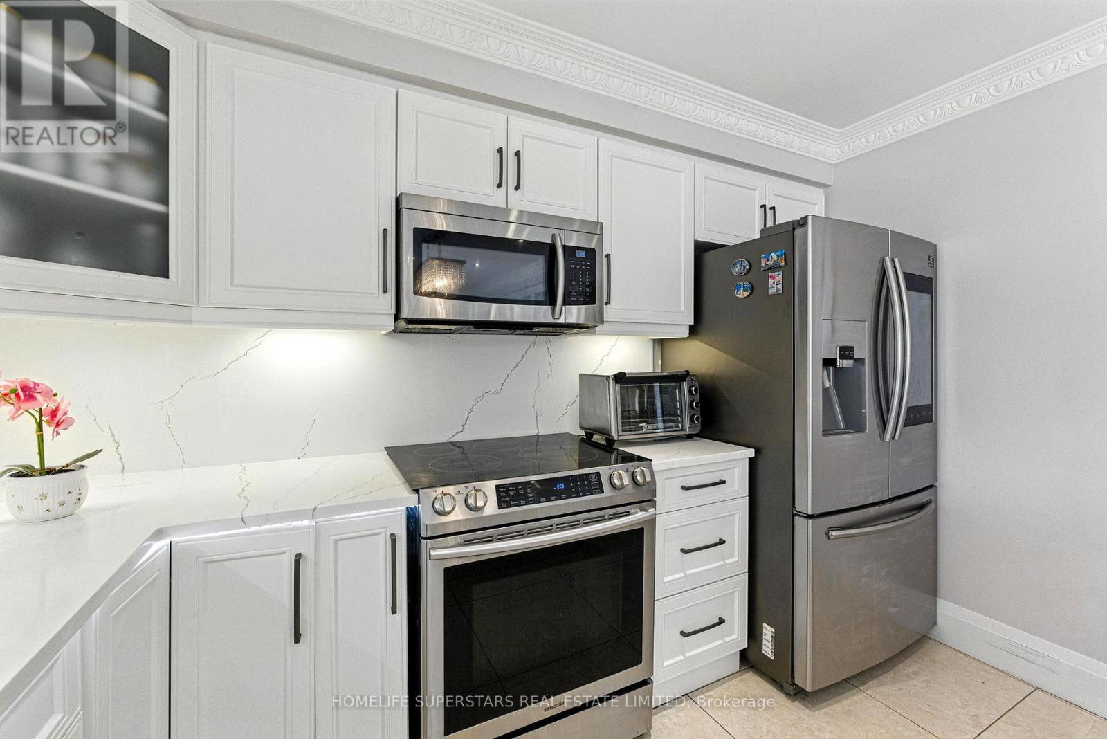 Photo 11 of 65 Nasmith Street, Brampton ON