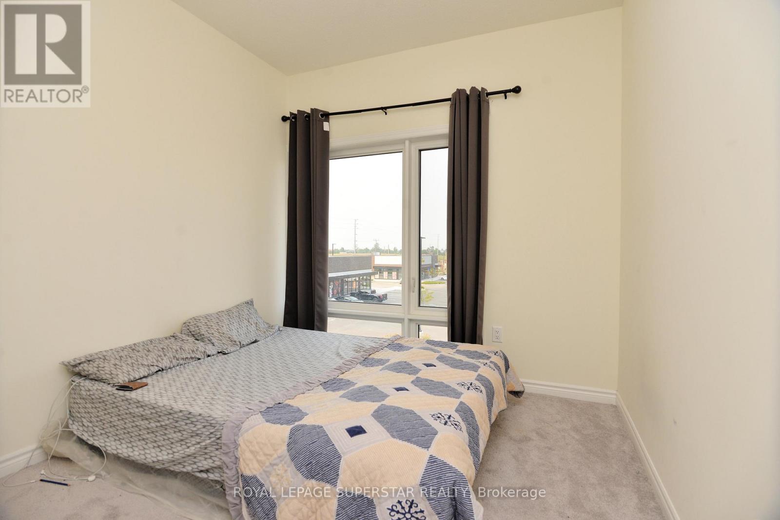 Photo 8 of 98 Donald Ficht Crescent, Brampton ON