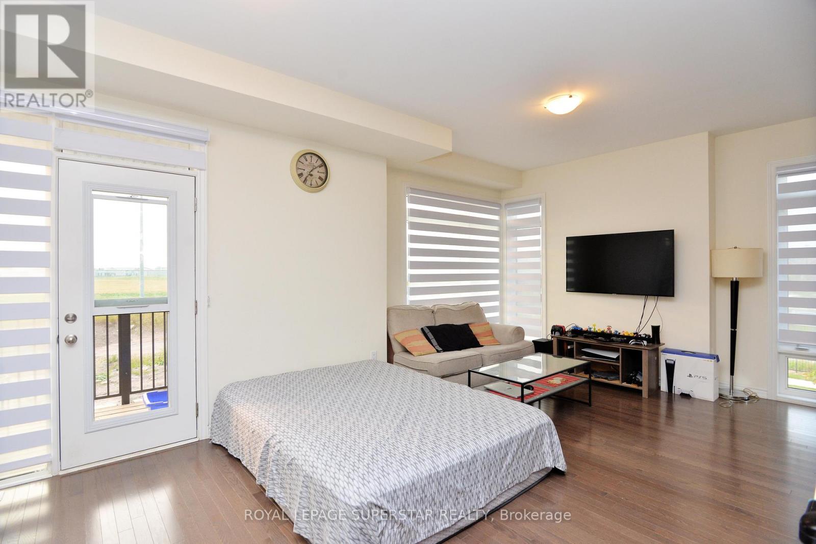 Photo 9 of 98 Donald Ficht Crescent, Brampton ON