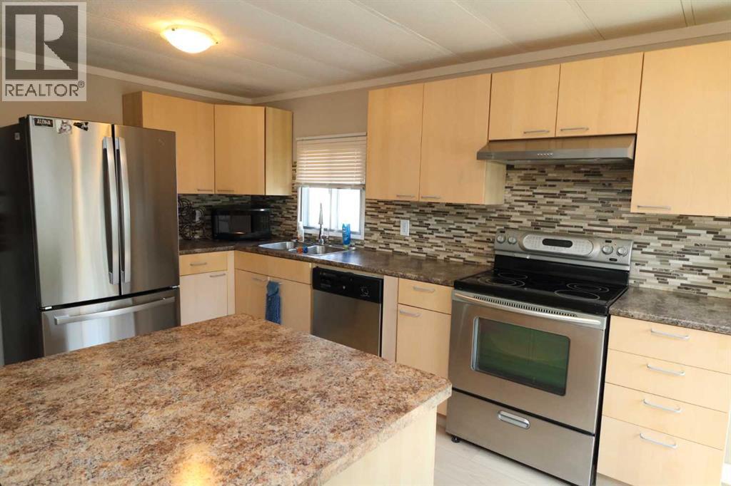 Photo 6 of 60 Spring Haven Road Se, Airdrie AB
