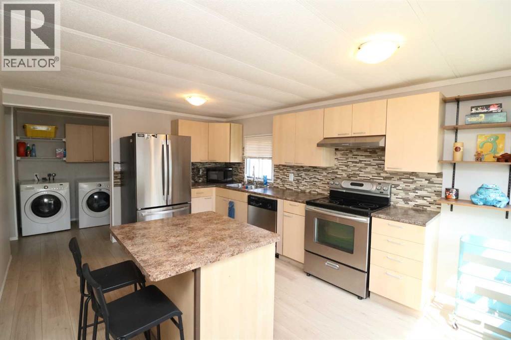 Photo 5 of 60 Spring Haven Road Se, Airdrie AB