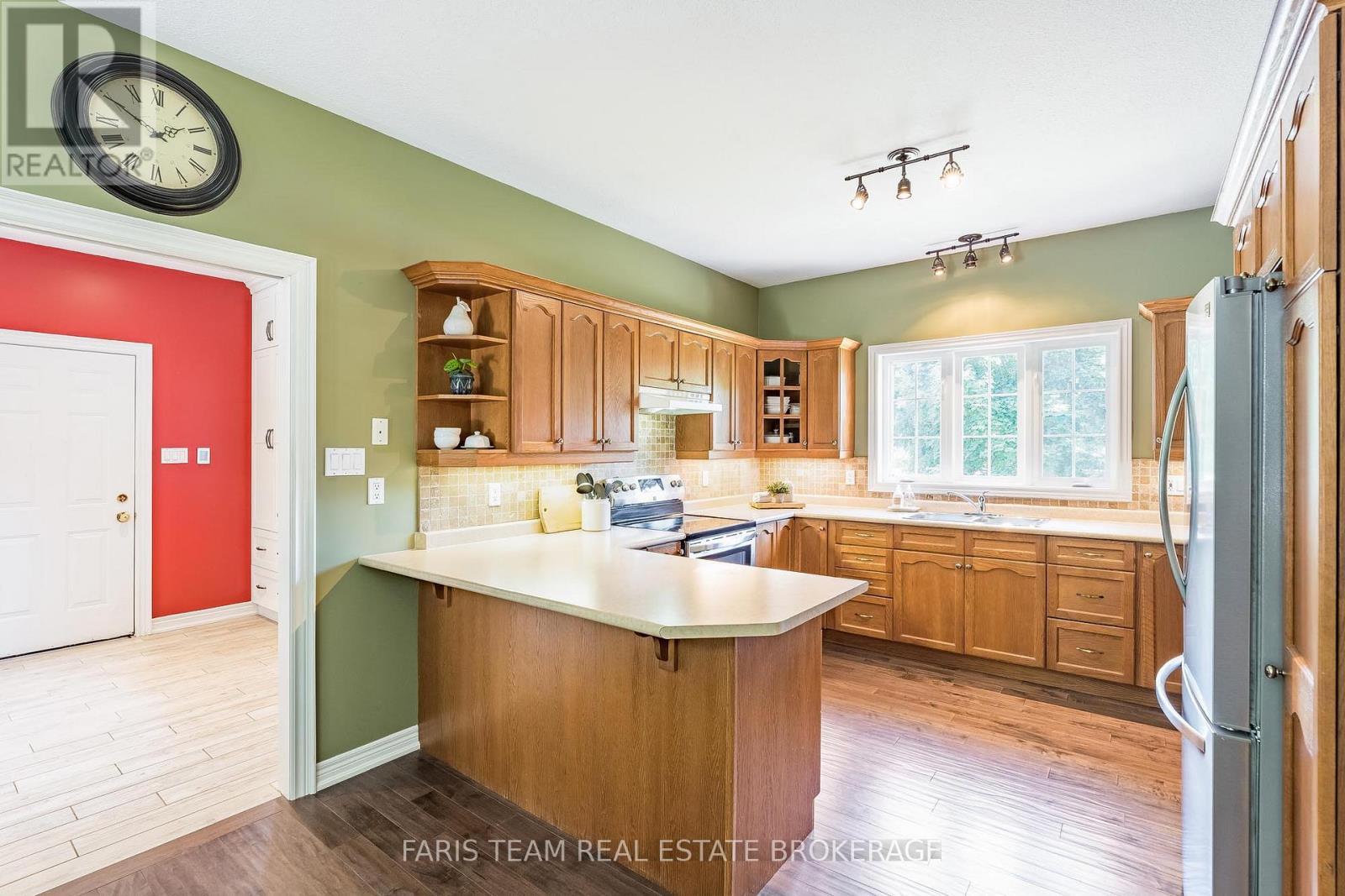 Photo 3 of 35 Parr Boulevard, Springwater ON