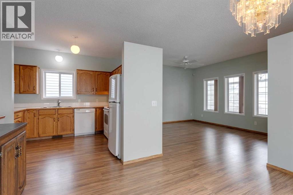 Single Family House Bungalow for Sale in  Covington Close NE Coventry Hills Calgary 