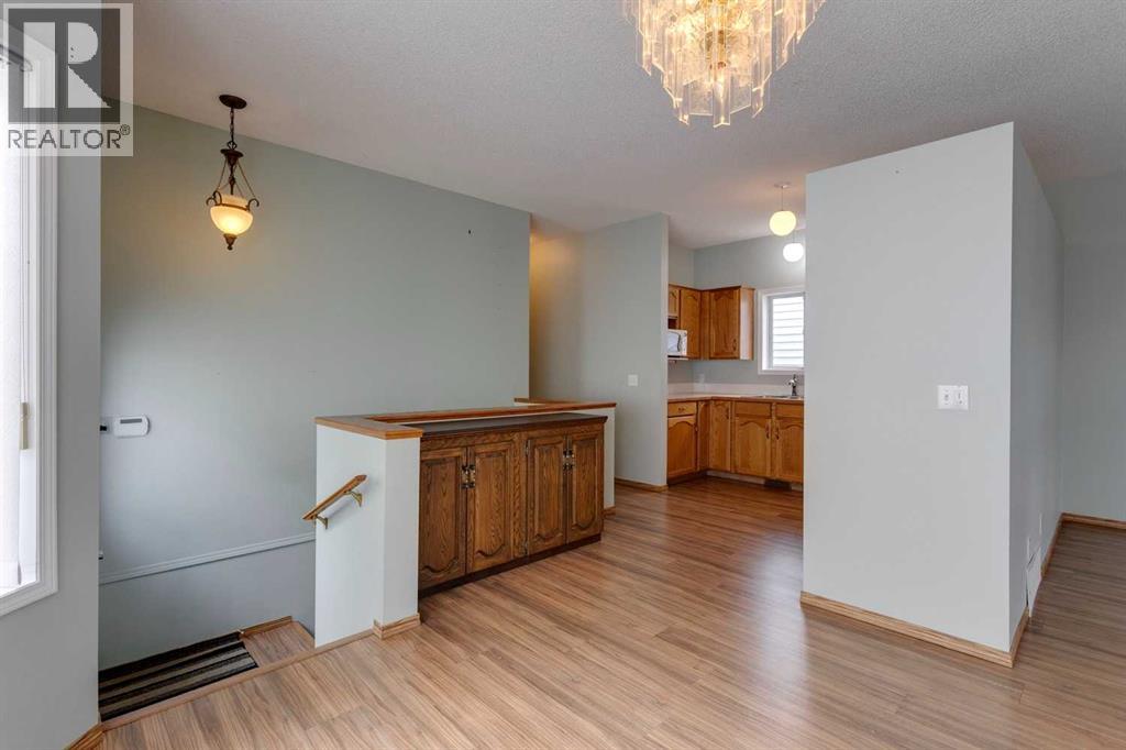 Single Family House Bungalow for Sale in  Covington Close NE Coventry Hills Calgary 