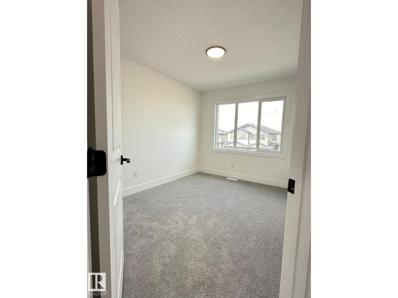 Photo 10 of 3608 40 Av, Beaumont AB