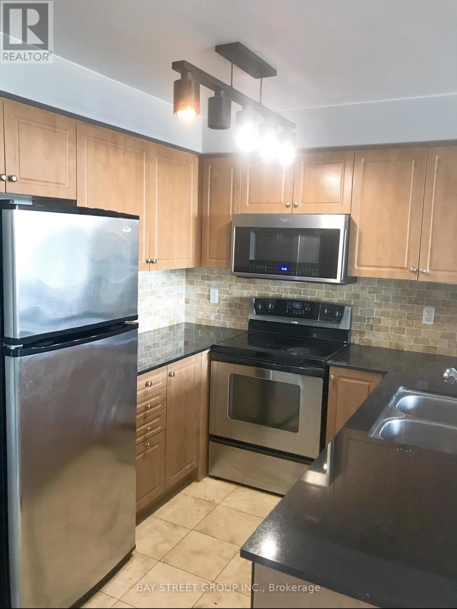 Photo 9 of 508 509 Beecroft Road, Toronto ON