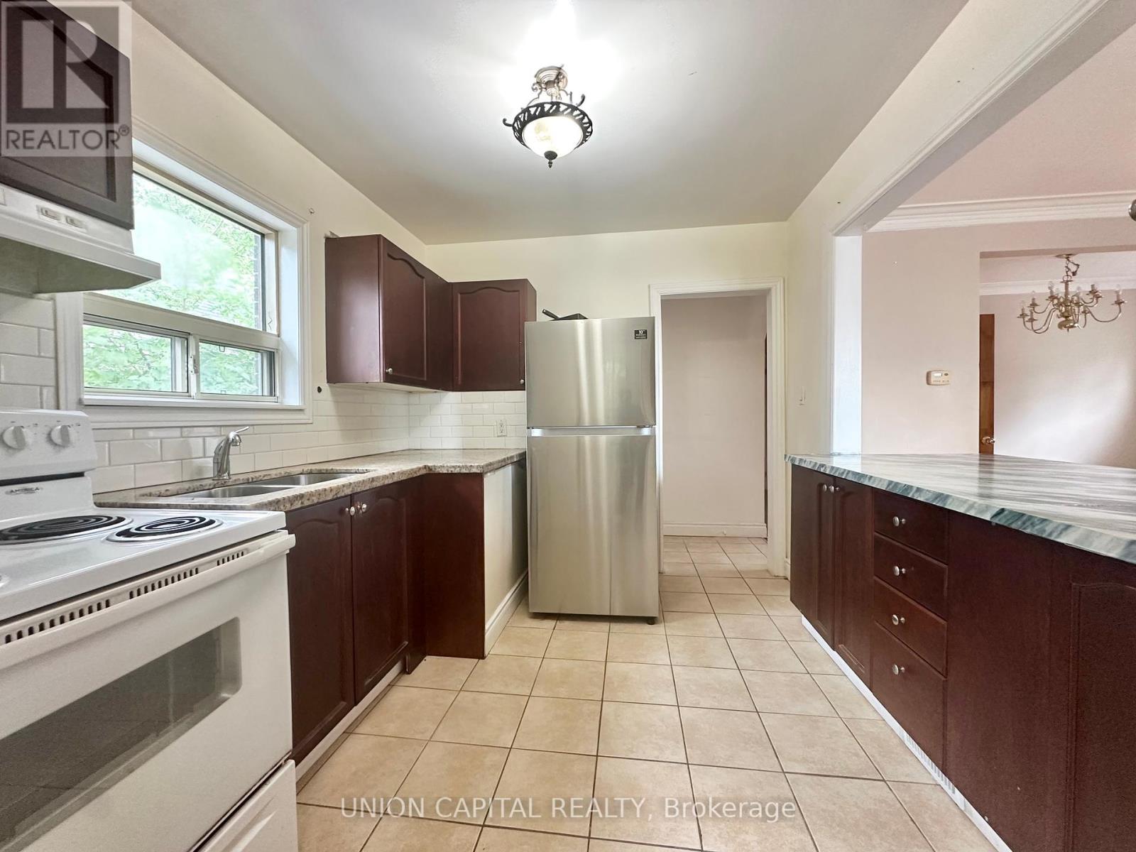 Photo 16 of Main Floor 1048 Kennedy Road, Toronto ON