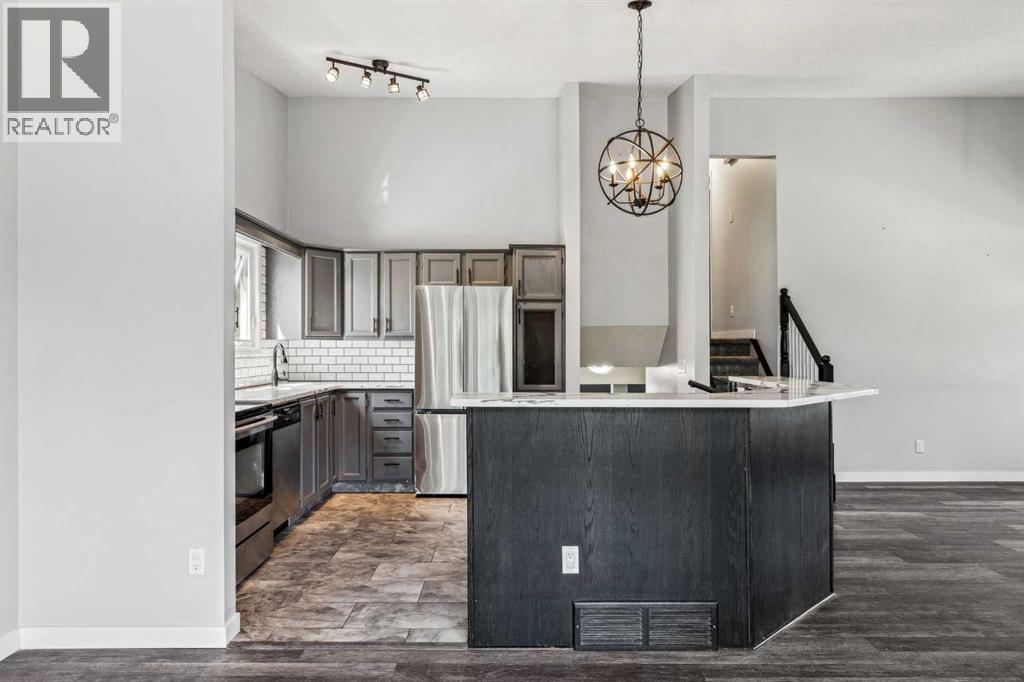 Single Family House 4 Level for Sale in  Hawkley Valley Road NW Hawkwood Calgary 