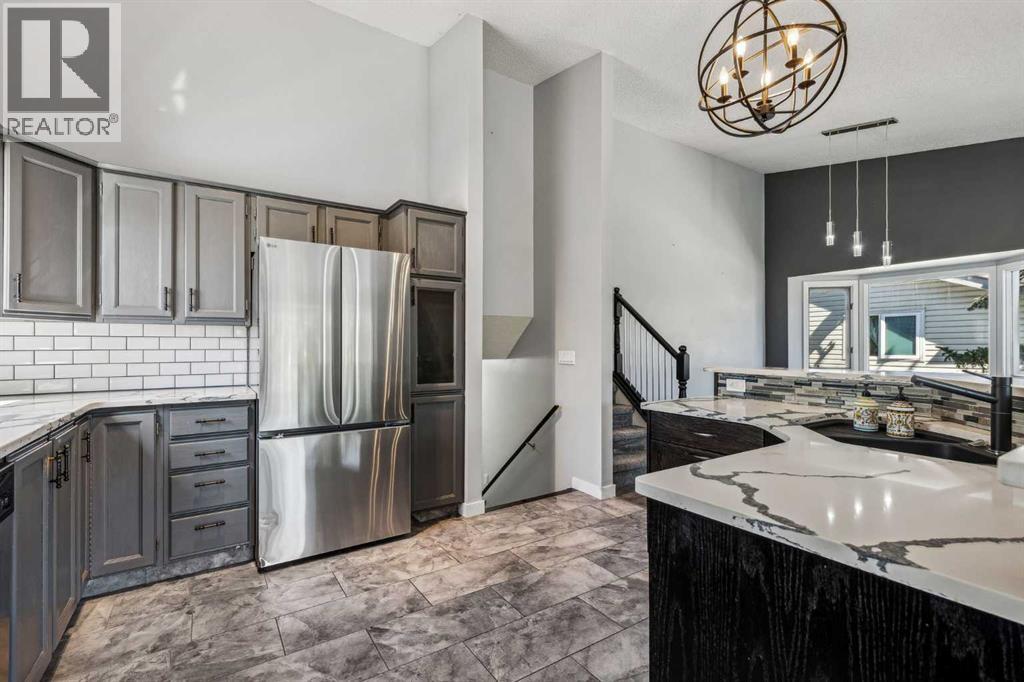 Single Family House 4 Level for Sale in  Hawkley Valley Road NW Hawkwood Calgary 