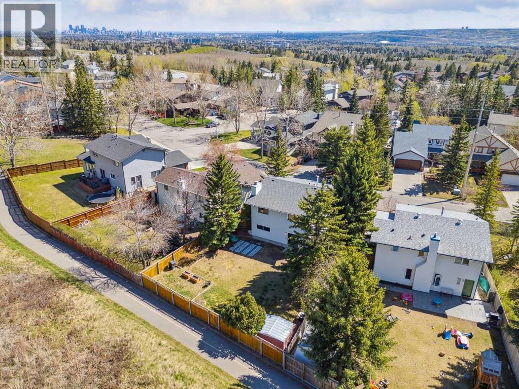 Single Family House 4 Level for Sale in  Hawkley Valley Road NW Hawkwood Calgary 