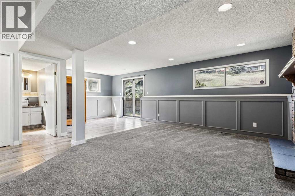 Single Family House 4 Level for Sale in  Hawkley Valley Road NW Hawkwood Calgary 
