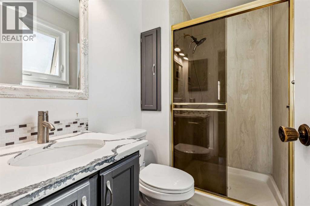 Single Family House 4 Level for Sale in  Hawkley Valley Road NW Hawkwood Calgary 
