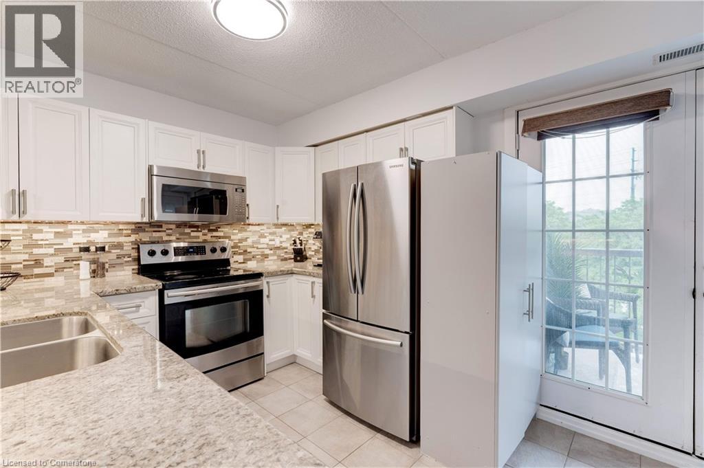 Photo 1 of 1800 Walkers Line Unit 302, Burlington ON