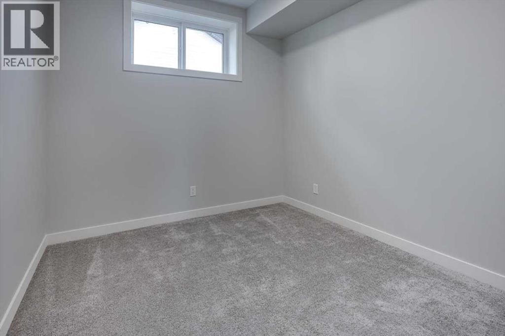 Photo 21 of 27 Station Drive, Sylvan Lake AB