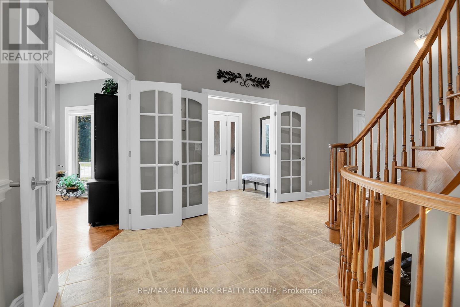 FOYER | french doors to vestibule & formal living