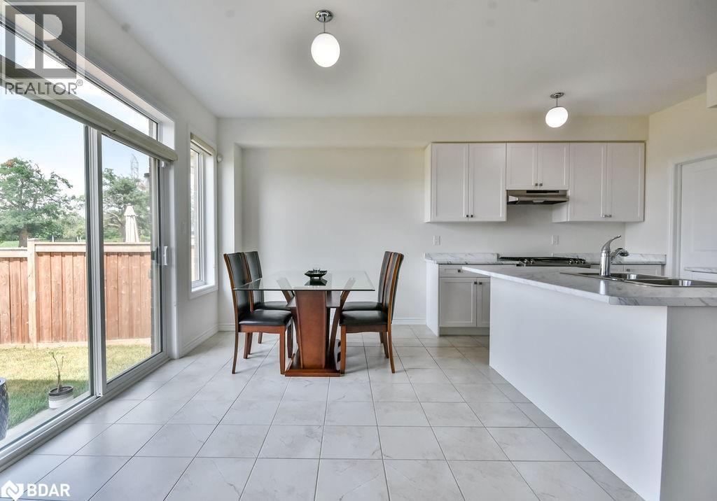 Photo 10 of 53 Rugman Crescent, Springwater ON