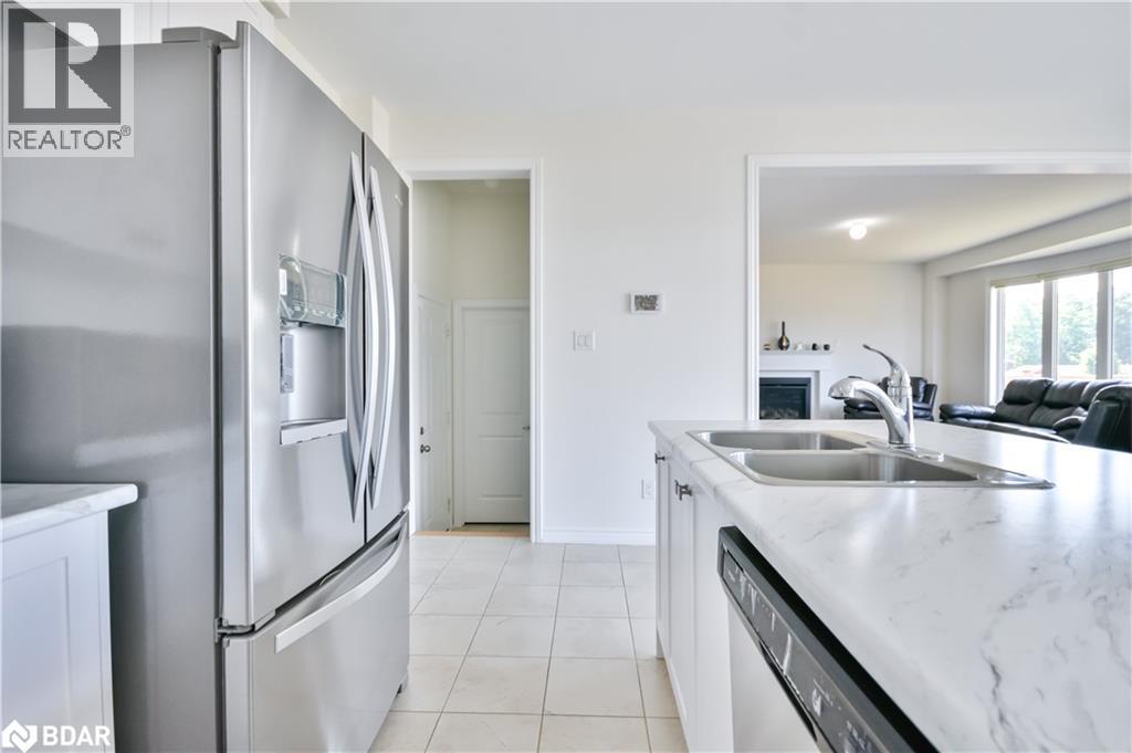 Photo 9 of 53 Rugman Crescent, Springwater ON
