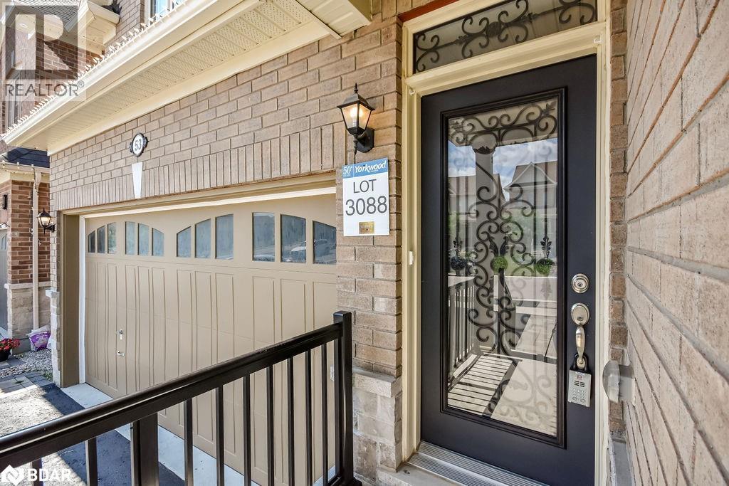 Photo 3 of 53 Rugman Crescent, Springwater ON